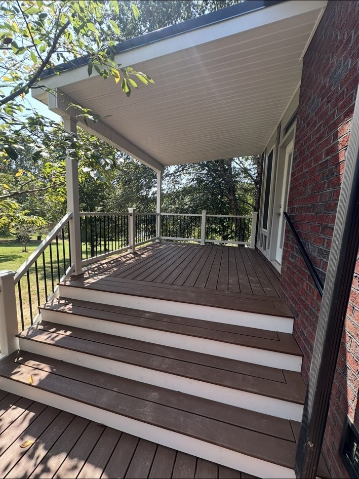 Covered deck with composite stairs