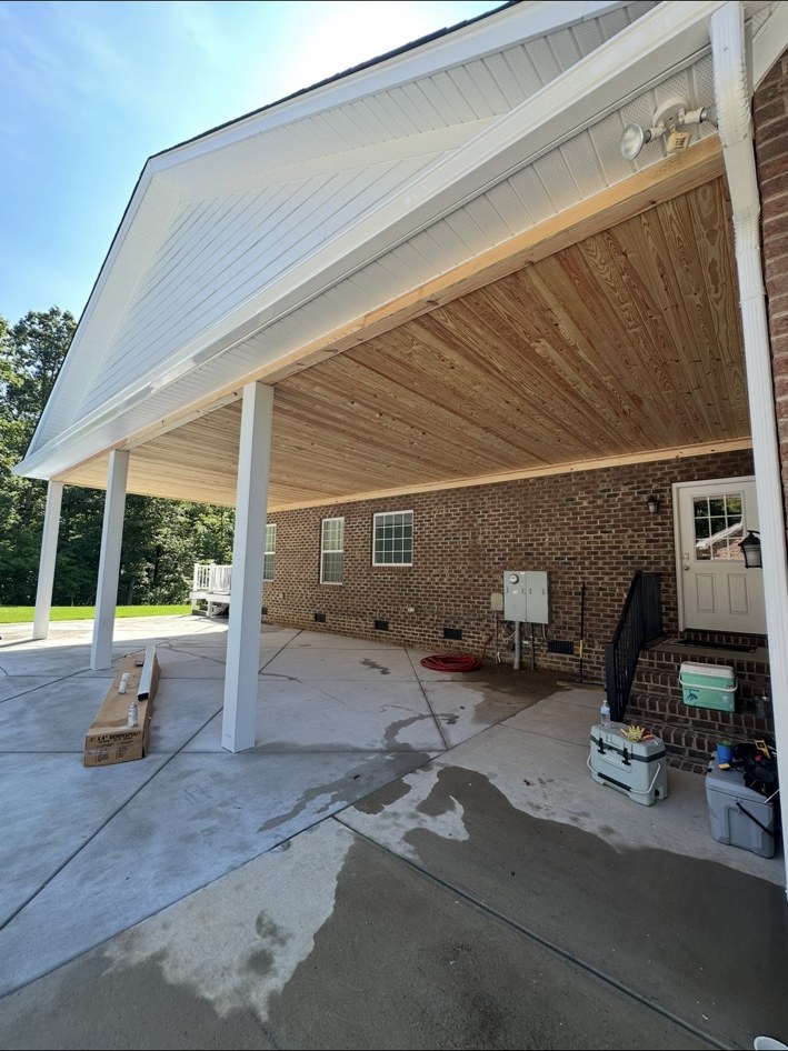Covered patio with wood ceiling