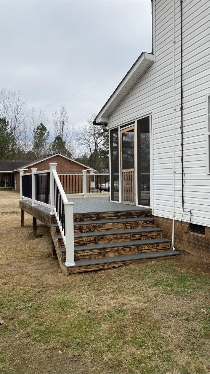 Deck stairs and contrasting railings