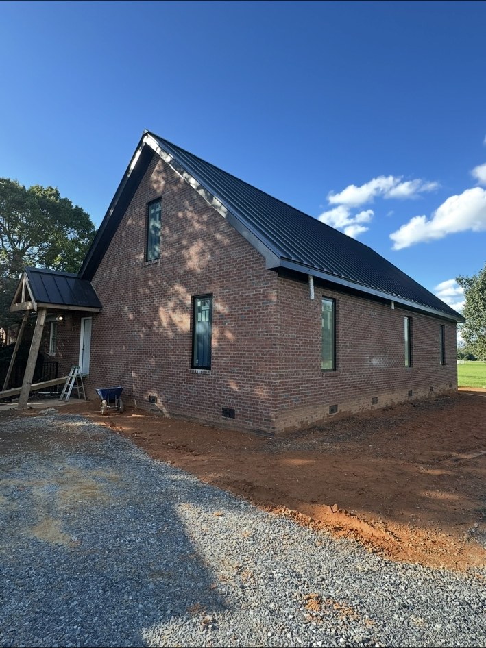 Brick exterior with standing seam roof
