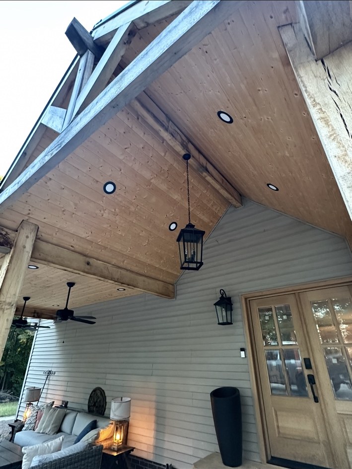 Covered porch with vaulted wood ceiling