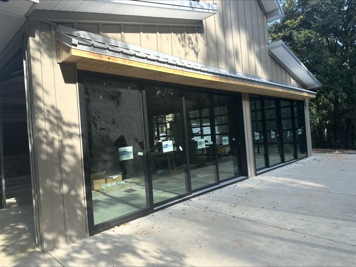 Glass exterior with metal awning