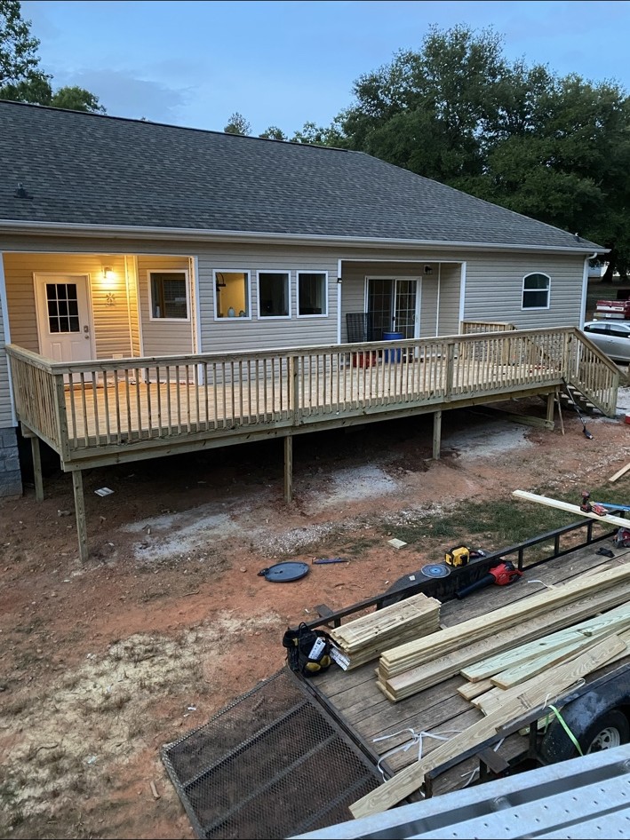 Wood deck with railing and stairs
